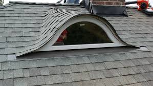 Curved window on sloped roof